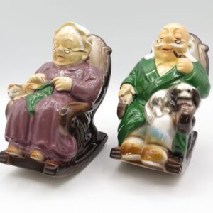two ceramic grandparents in rocking chairs